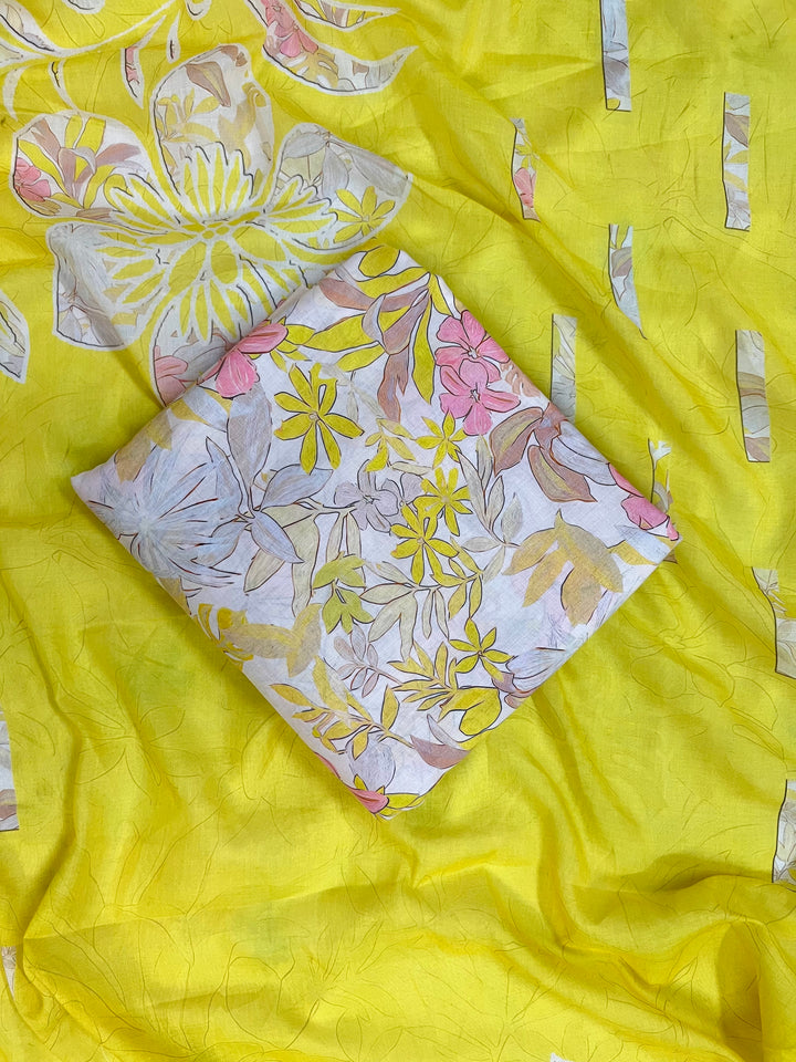 cotton yellow  unstiched suit with  printed soft dupatta & bottom